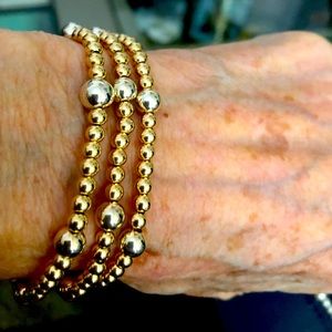 Triple wrap elastic bracelet/necklace with gold filled beads.